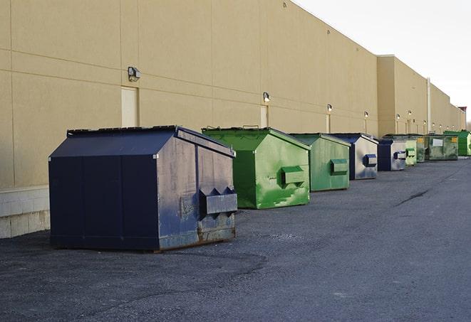 dumpsters for debris management at a worksite in Balmorhea